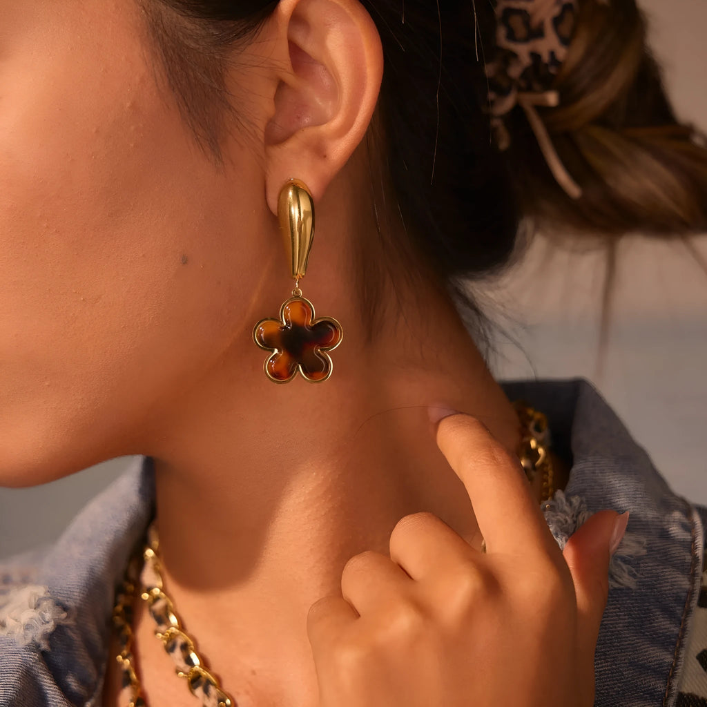 Tortoiseshell resin Hawksbill colour earrings in heart or flower shape made from 18K stainless steel.