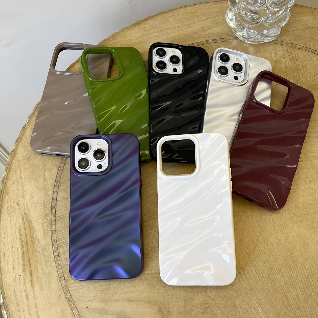 Soft wave pleated TPU phone case for Apple iPhone 17 in a selection of colours including electroplated gold and matte purple.