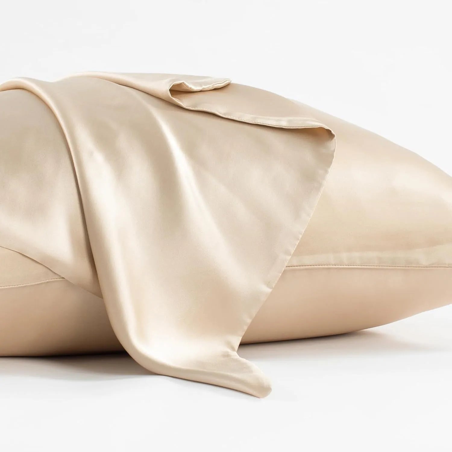 Dark grey silk pillowcase with envelope closure shown folded to display fabric texture