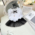 White polyester gauze skirt dog dress on a small dog, showing princess-style gathered skirt.