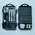 115-in-one manual screwdriver tool set with carbon steel cutter head and 90mm bar on a flat surface