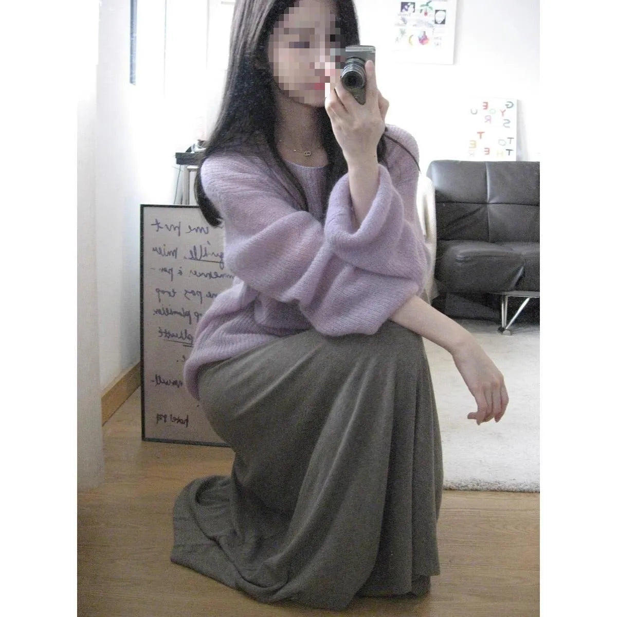 Purple women's Ice Silk blouse with hollow-out princess sleeves on a hanger.