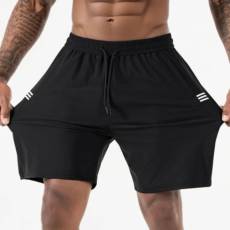 Men's black high-waist quick-drying nylon ice silk sports shorts on a hanger.