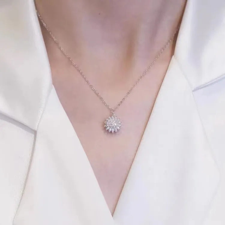 Rotatable sunflower pendant necklace with zircon stones on gold-plated copper chain in golden finish