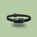 Black wearable wifi neckband camera recorder on a table with TYPE-C cable, dimensions 61.5x27x27mm.