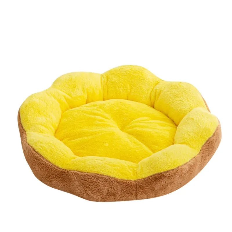Round grey and black cloth cat bed with thick sides and a soft, detachable rabbit plush decoration on the rim.