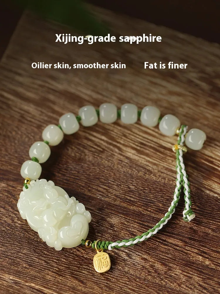 Year of Rabbit Chinese zodiac bracelet with Hetian jade charm, S925 silver card, and red ice cotton rope.