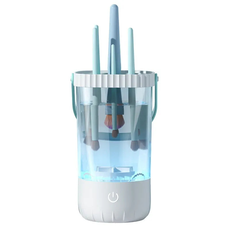 White plastic rechargeable electric cleaning brush for makeup brushes with data cable.