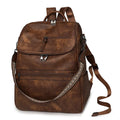 PU leather college backpack with curved shoulder strap in solid colour with stitching detail.