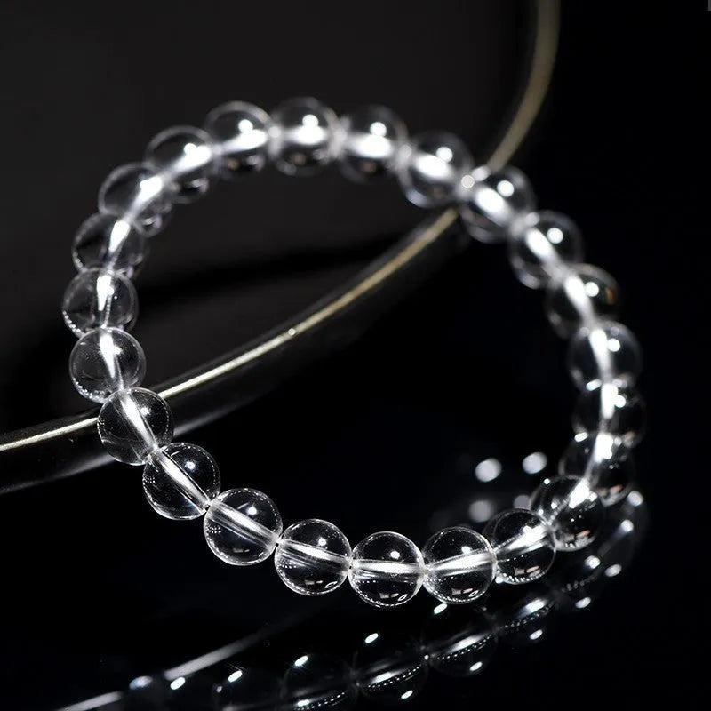 Natural Donghai old materials white water round bead crystal bracelet in old mine white on a wrist.
