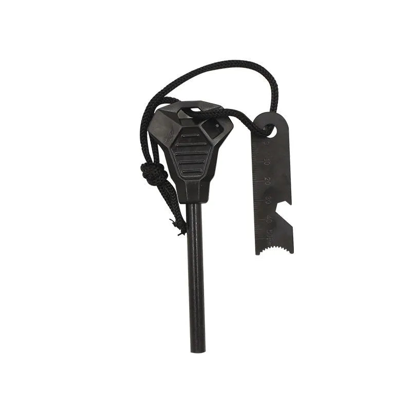 Black outdoor survival multi-tool showing magnesium rod flint and stainless steel scraper with multiple functions.