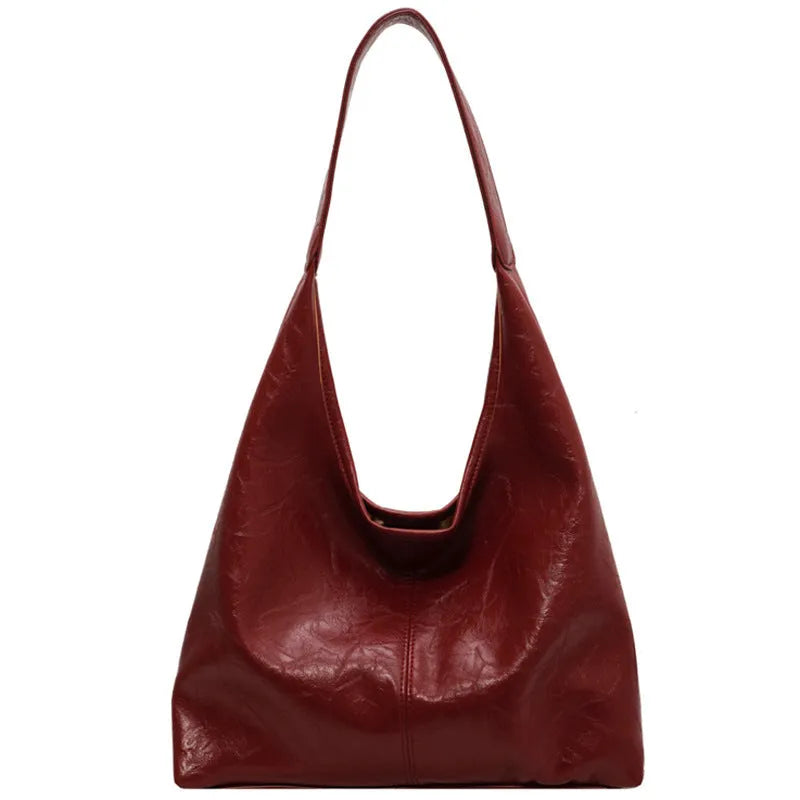 Soft leather shoulder bag with sandwich pocket exterior in multiple colour options