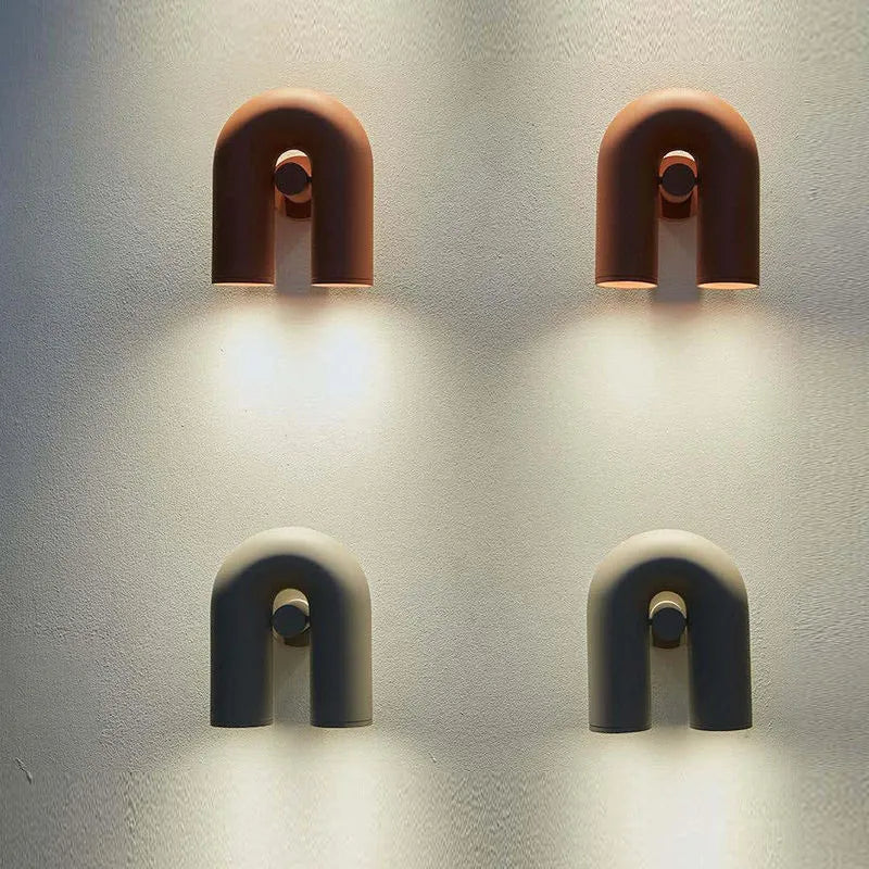 Macaron U-shaped creative wall lamp in orange, blue, grey, or black with 220V voltage and three-colour light source
