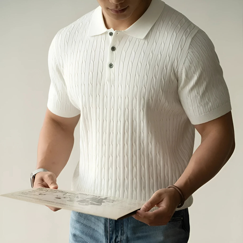 Men's khaki short sleeve business top on a hanger, showing the collar and button placket.