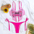 Women's purple bow ins style split bikini suit top and briefs on a mannequin.