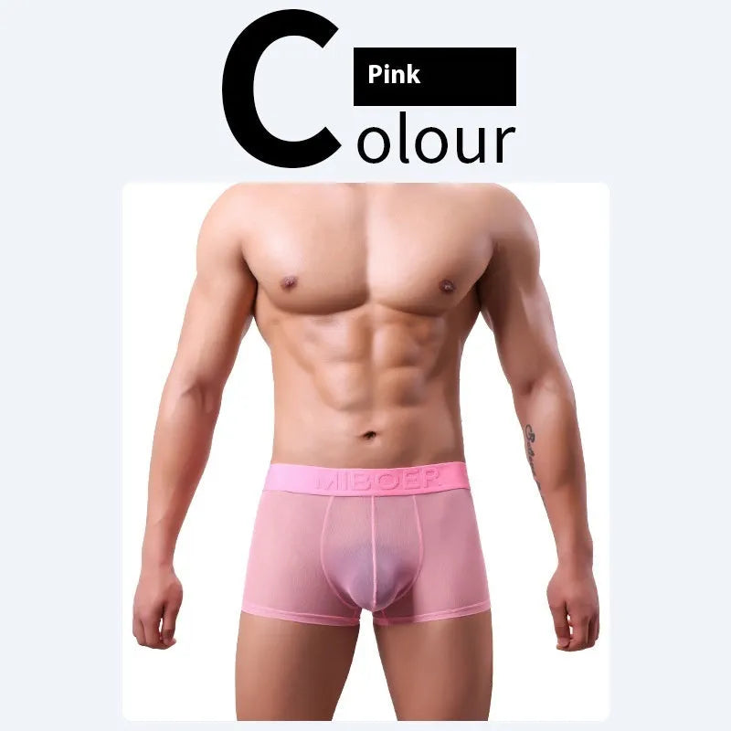 Men's solid colour thin polyester boxer shorts in sapphire blue, laid flat.