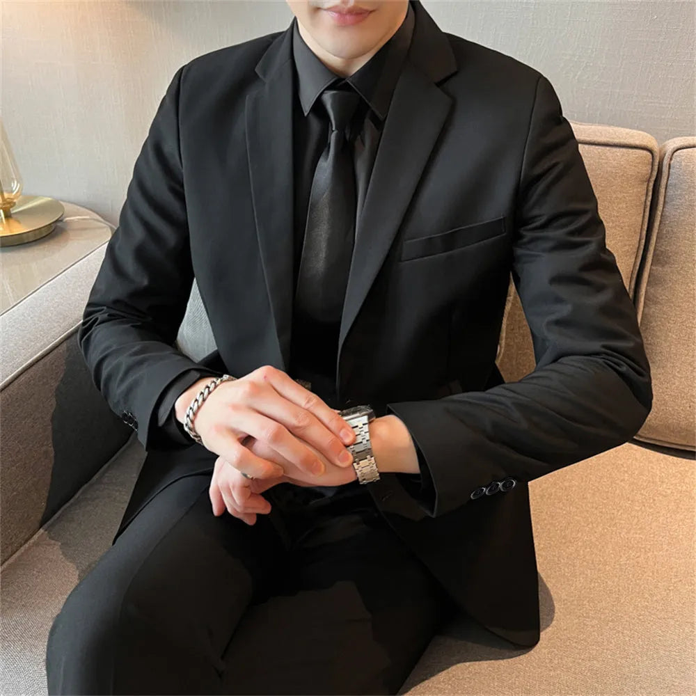 Men's slim fit corduroy suit set including jacket, trousers, shirt, and tie in a spring business casual style