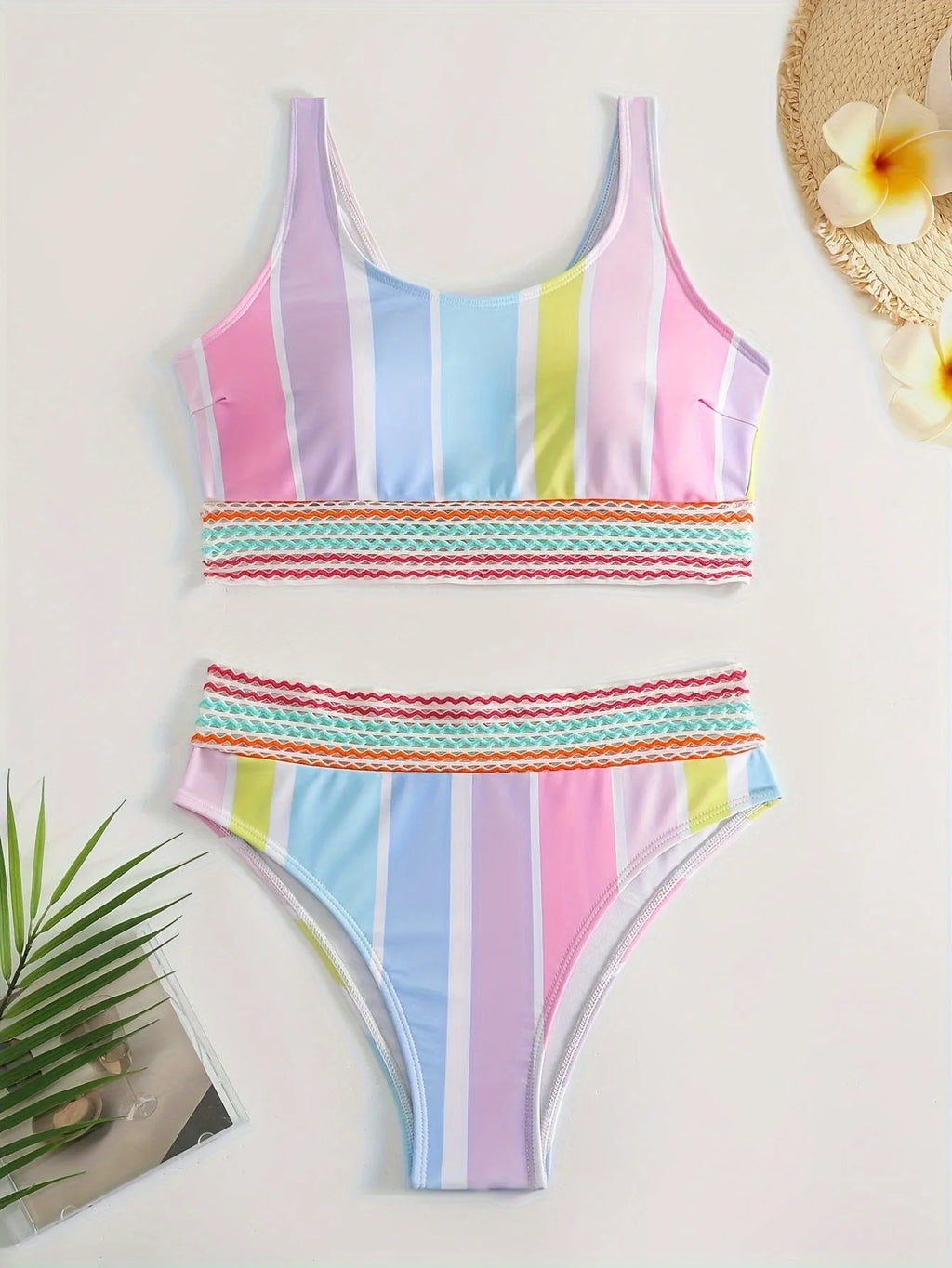 Women's striped bikini top and briefs set on a mannequin, showing the European-American style brief cut and spandex lining.