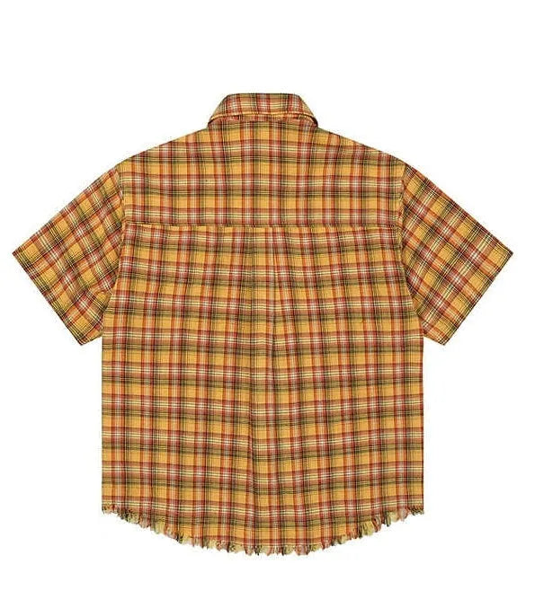 Yellow plaid short sleeve shirt with embroidered pocket detail and loose fit design