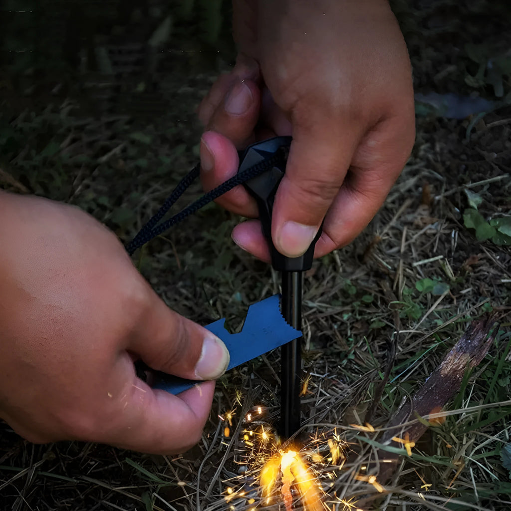 Black outdoor survival multi-tool showing magnesium rod flint and stainless steel scraper with multiple functions.