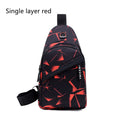 Men's blue print sling chest crossbody bag showing earphone hole and zipper pocket.