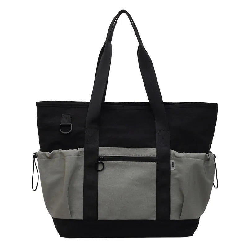 Women's Oxford travel bag in grey with 36-55L capacity and letter pattern