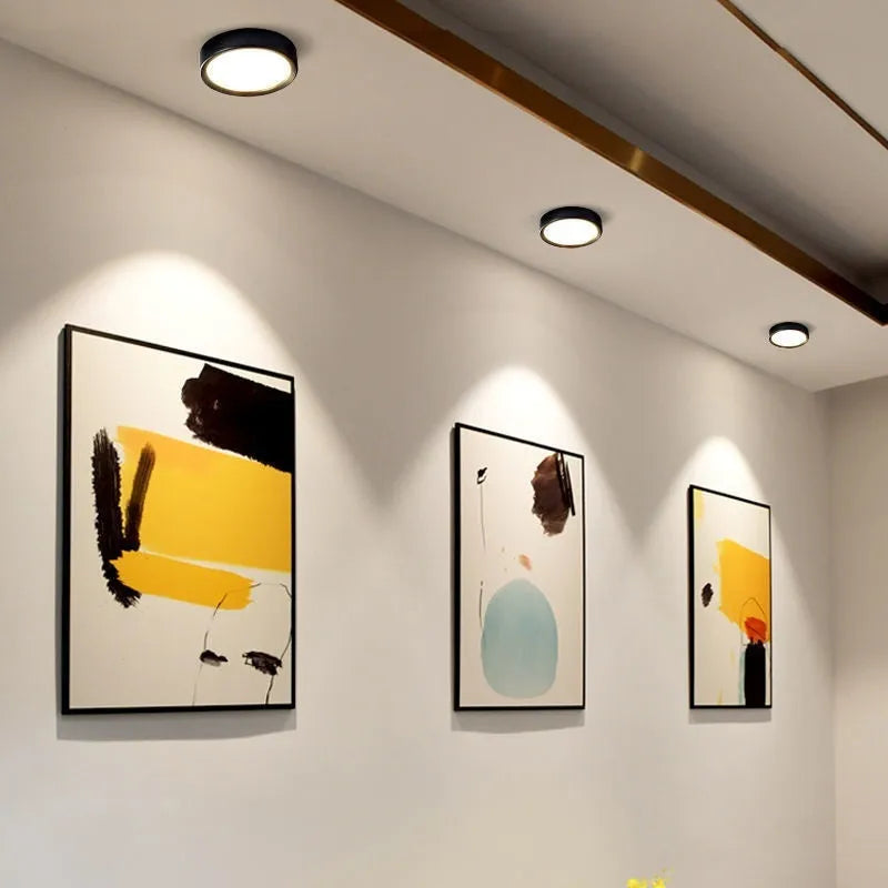 LED ultra-thin surface mounted downlight with adjustable colour temperature in various shell colours