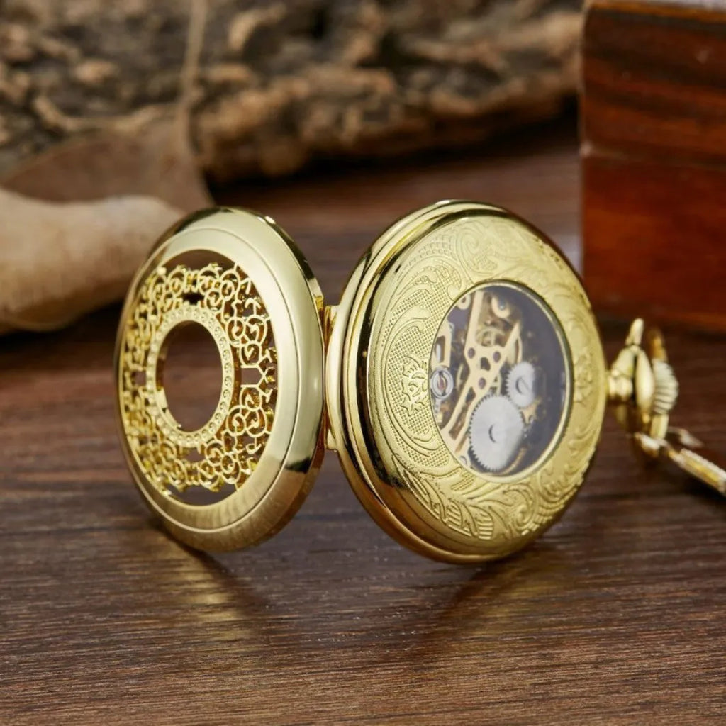 Retro mechanical pocket watch with hollow floral dial and transparent case back showing internal mechanism