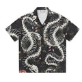 Men's short sleeve Cuban collar shirt with a snake bone floral pattern print in assorted colours.