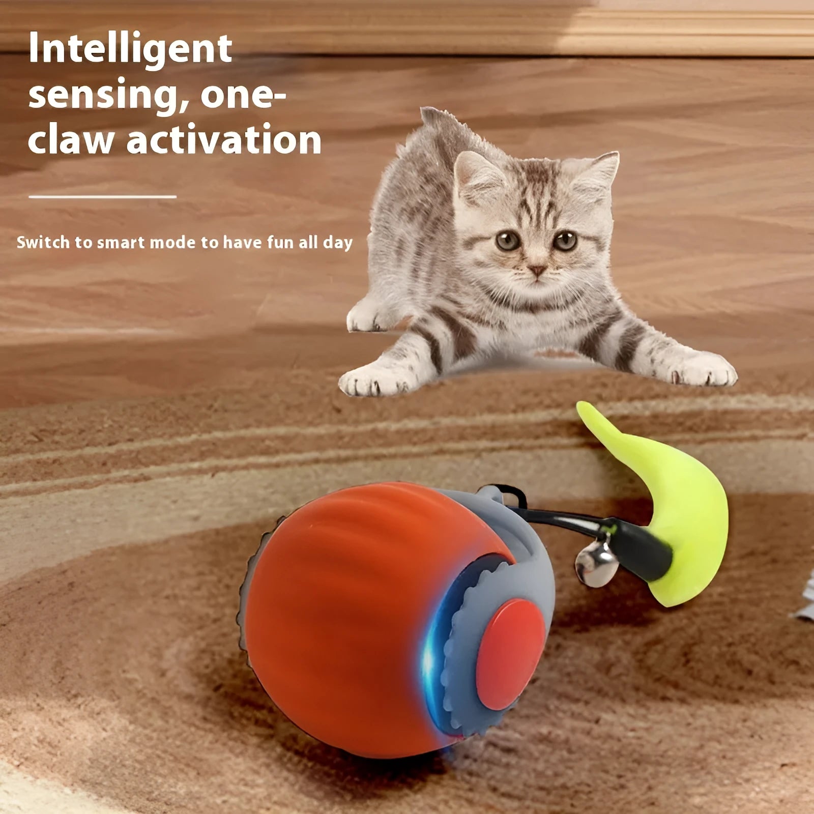 Automatic gravity-sensing cat toy with rolling ball and tail attachment in blue colour with gun grip handle
