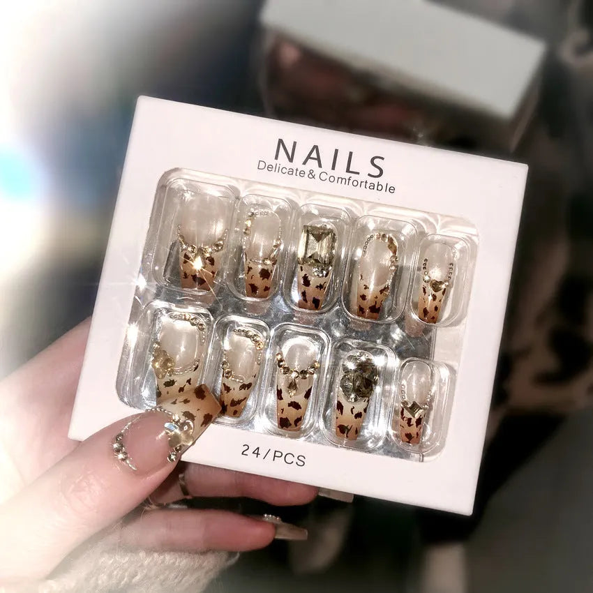 Leopard print wearable nail armor set with advanced flash finish on a white background