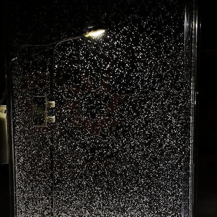 DIY magic snowy landscape night light kit with small street lamp on a desktop