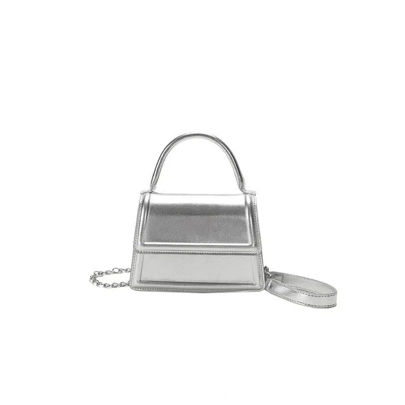 Women's retro crossbody bag in six colour options showing horizontal square shape and shoulder strap