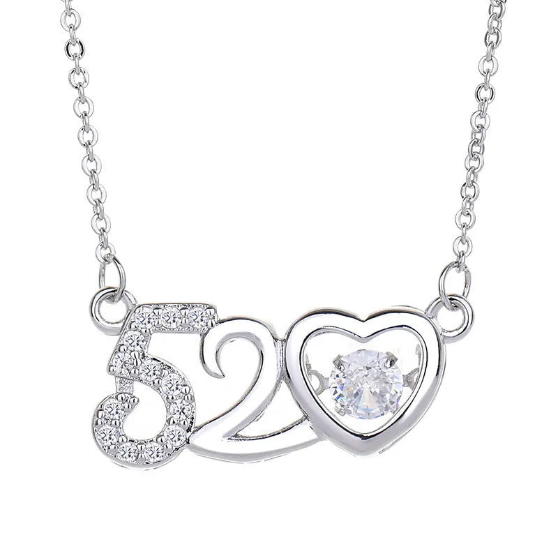 Sterling silver heart necklace with crown detail on a 45 cm chain, shown in silver and rose gold finishes.