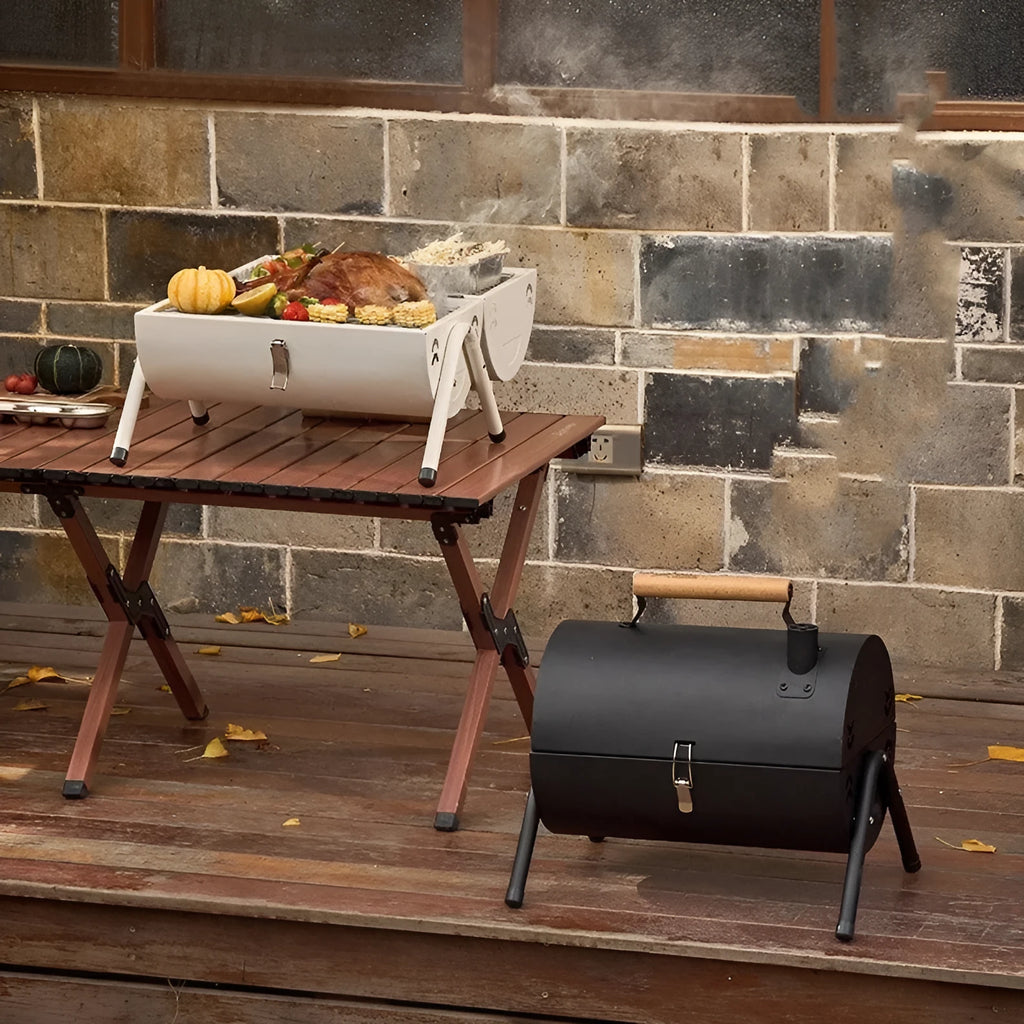 White round chimney oven style portable grill for frying and baking outdoors.