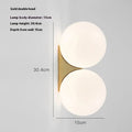 Simple glass ball wall lamp with gold finish and iron frame for bedroom bedside
