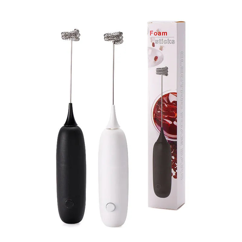 Black and white hand-held electric milk frother blender with modern design for coffee preparation