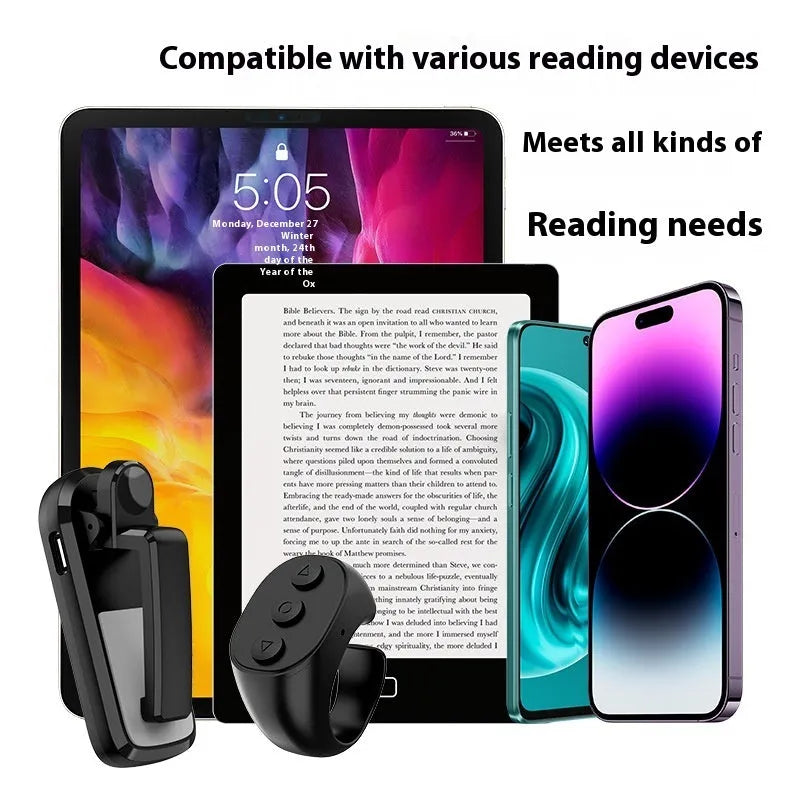 Black wireless page turner remote and clicker for tablets on a wooden table.