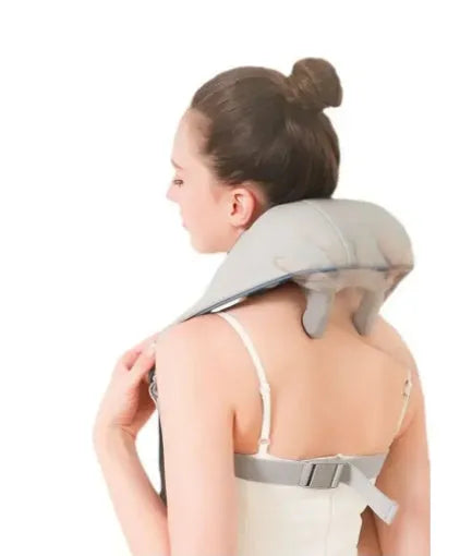 Milky white rechargeable shoulder and neck cervical massager with USB cable.