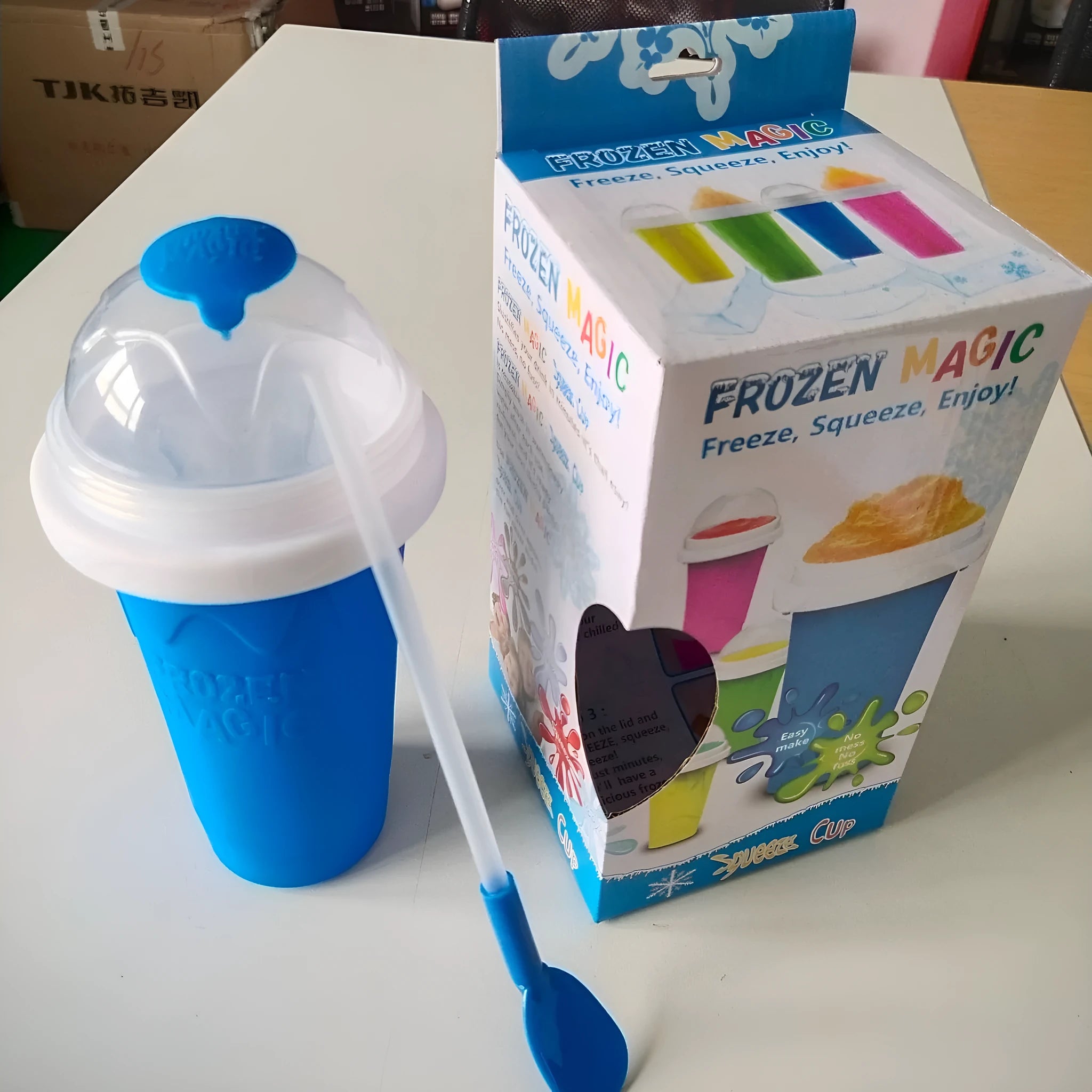 Blue silicone pinch cup for making instant slushy drinks, showing double-wall construction.