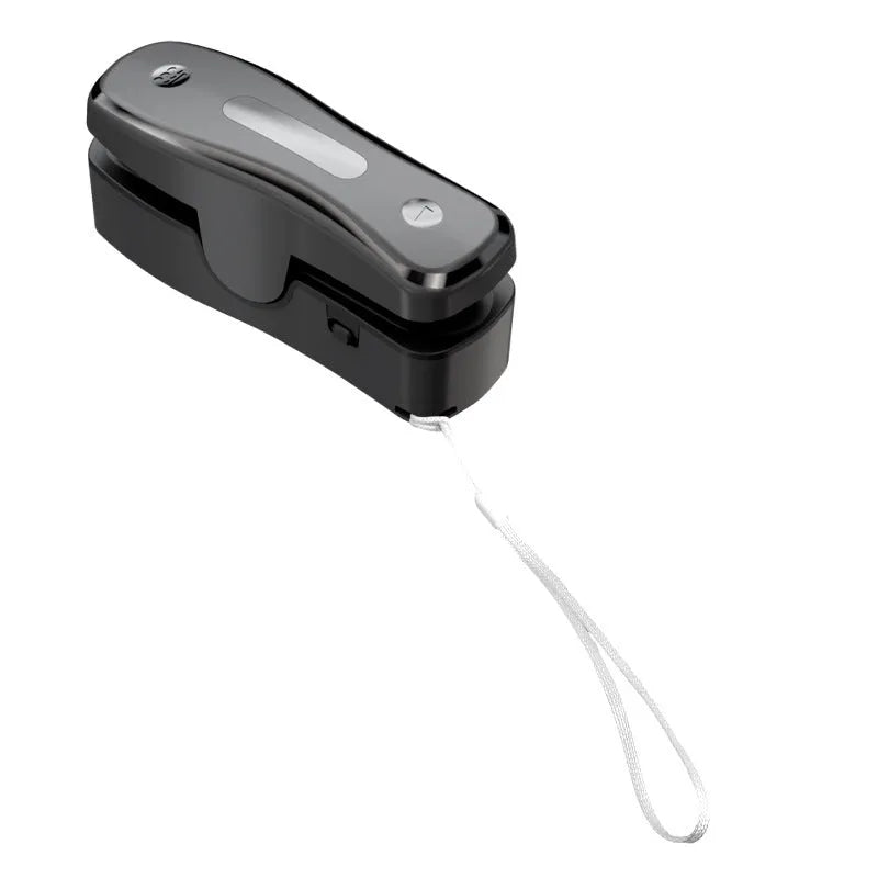 Rechargeable mini USB sealing machine in milky white with Type-C charging port and magnetic patch
