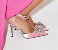 Women's pink satin sandals with heart-shaped rhinestone strap and winding tape fastening