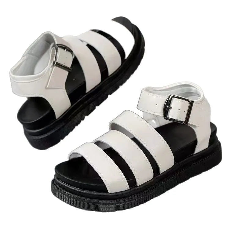 Black thick sole buckle sandals showing fish mouth round toe design and adjustable strap