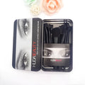 12 black makeup brushes in a tin box with nylon bristles and wooden handles on a white background
