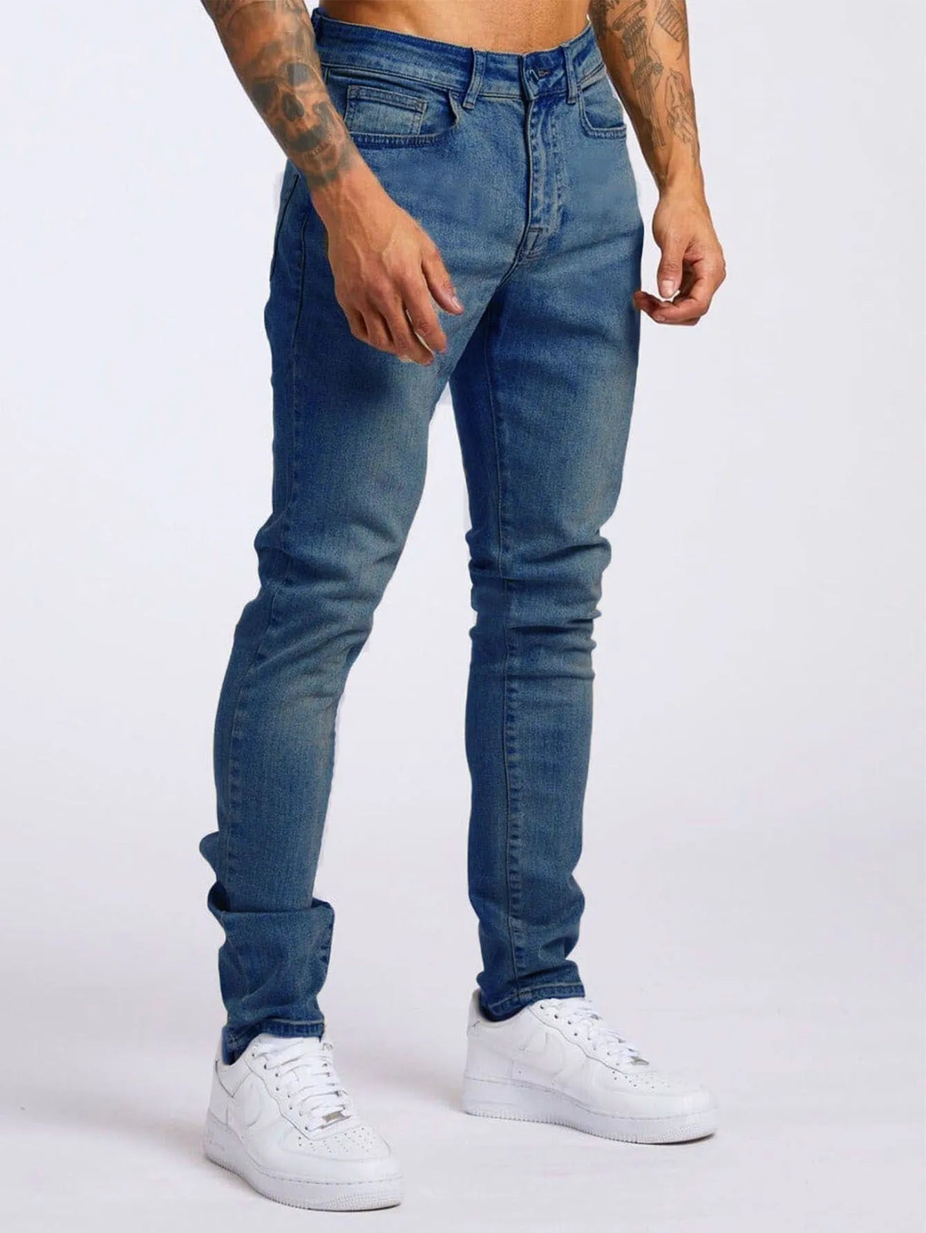 Men's fashion casual slim fit high waist jeans in light blue cotton with solid colour finish