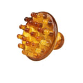Brown and yellow disc-shaped massage comb with 21 teeth for scalp and meridian stimulation