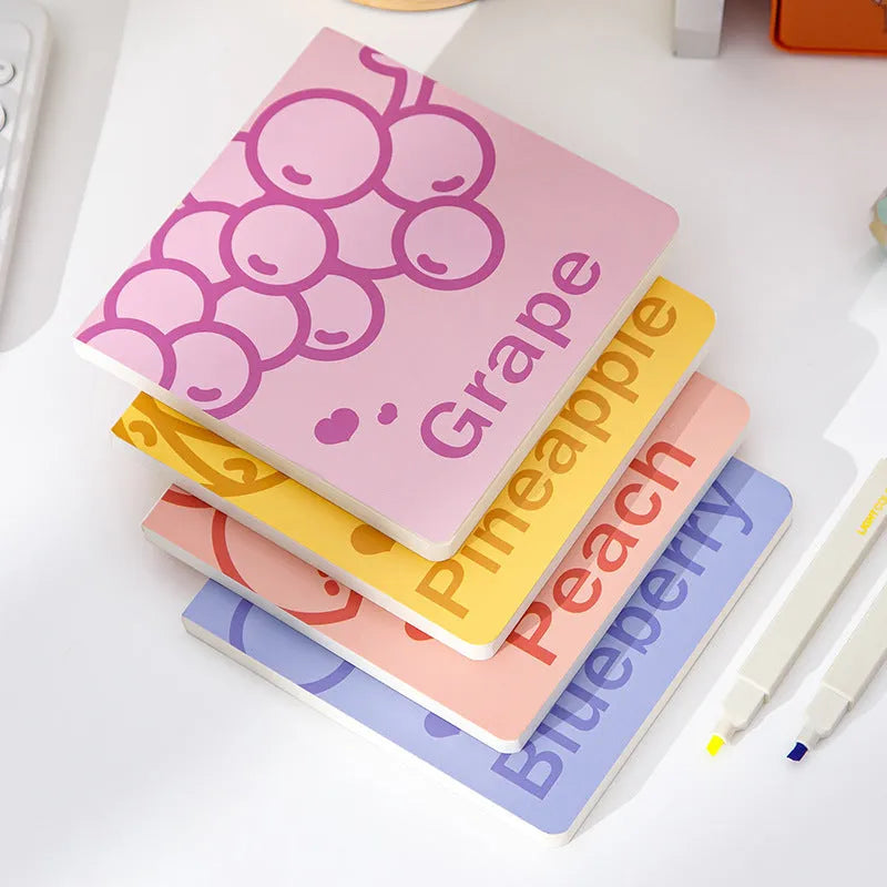 Square 14.5cm notebook with fruit-embossed cover showing pineapple, blueberry, grape or peach designs