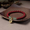 Traditional Chinese cinnabar and copper bead bracelet with wave shape design in national style