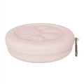Collapsible silicone dog feeding bowl with lid shown in a green colour.