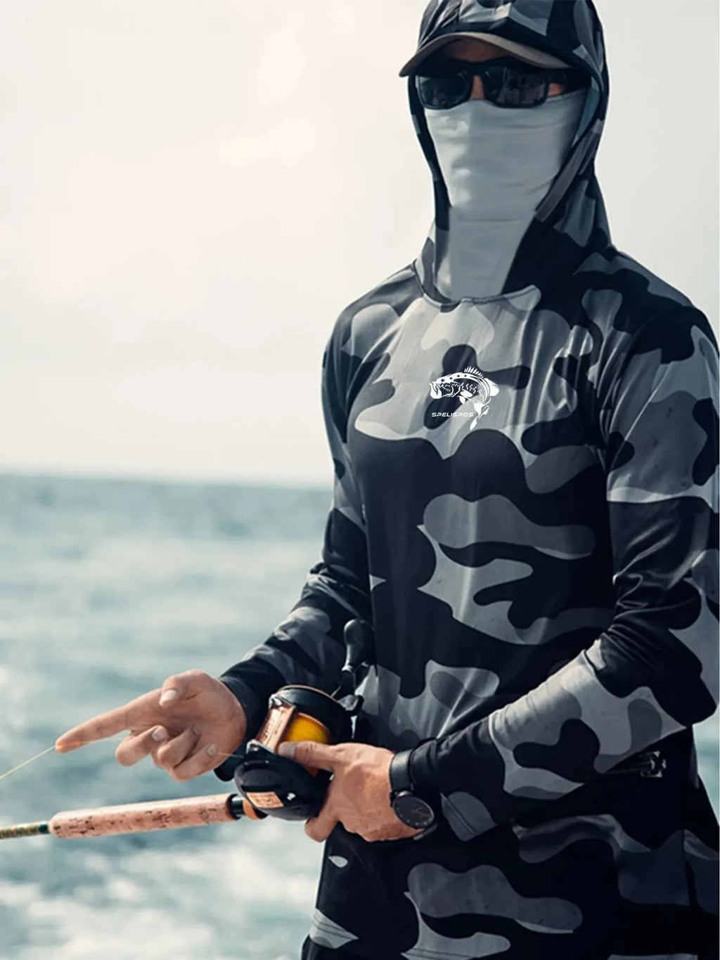 Huk men's grey long sleeve fishing hoodie showing mesh side panels and crew neck.